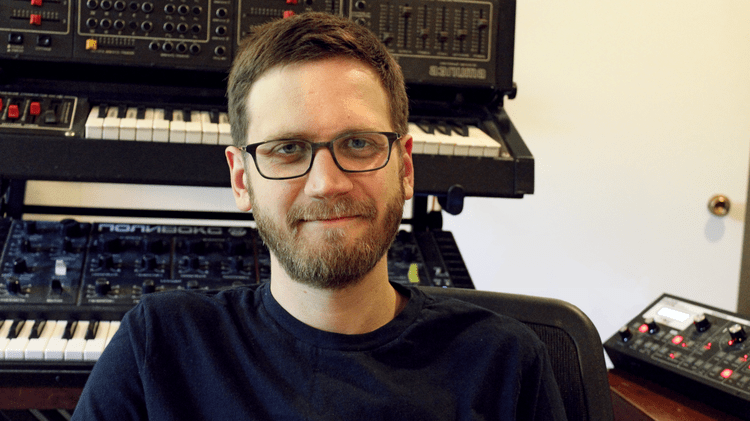 Adam Fligsten in his music studio